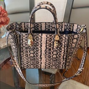 Henri bendel pink snake print bag